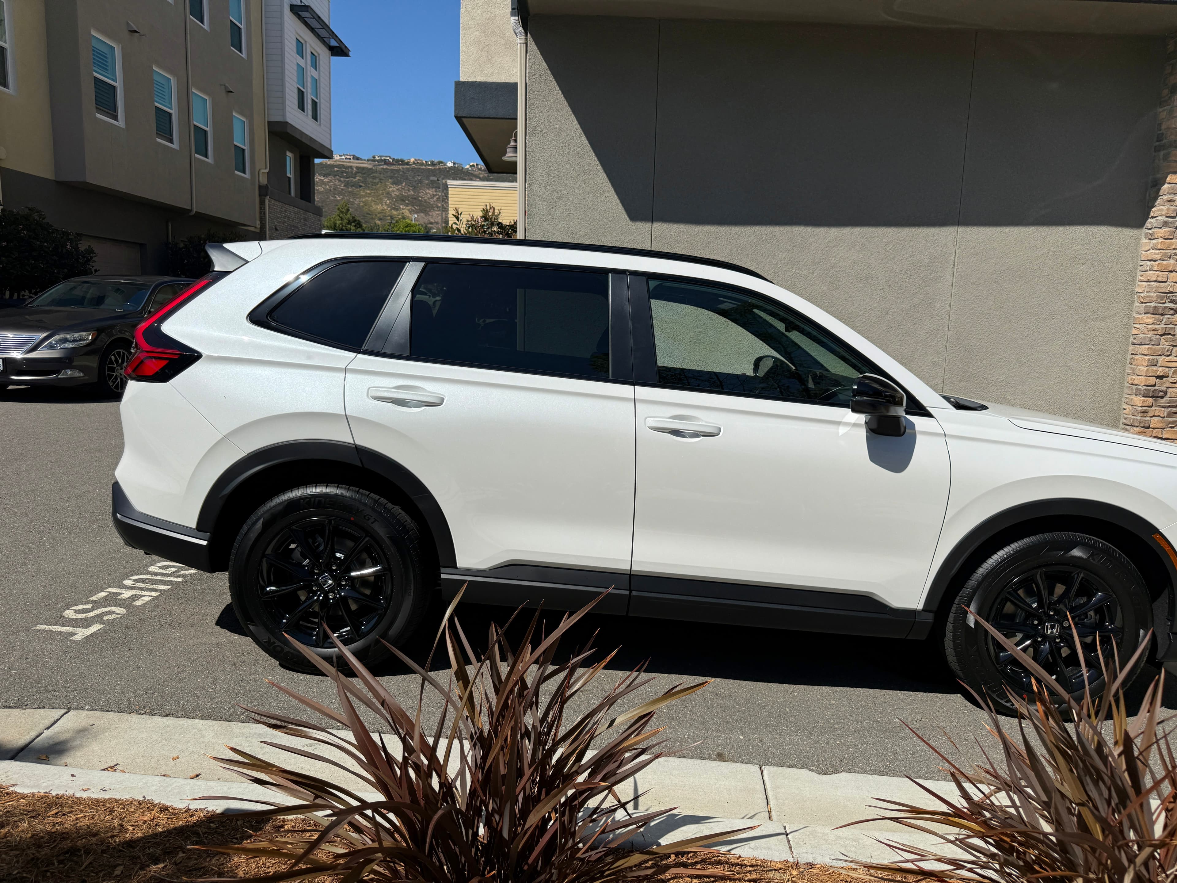 2026 white honda cr-v residential driveway