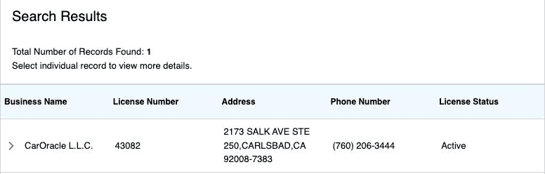 CarOracle L.L.C.'s record in the California DMV Occupational License Lookup, showing license 43082 with an Active status.